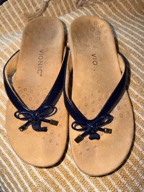 Vionic Navy Bow Thong Sandals for Women with Gold Accents